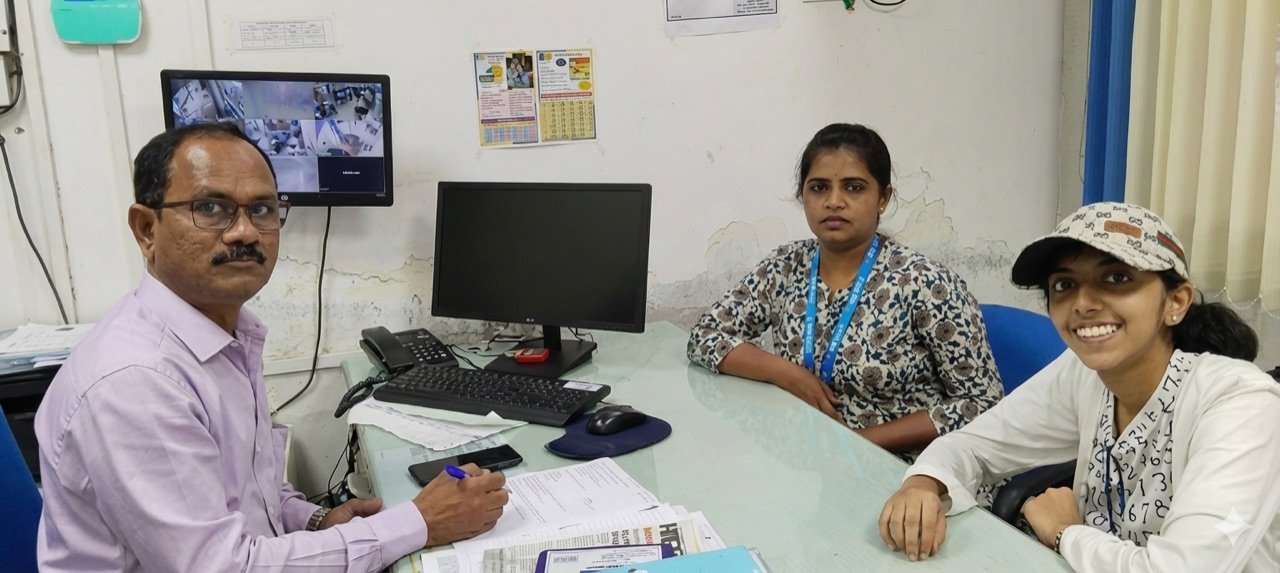 A local banking conversation around a desk